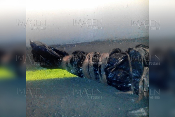 Arrojan cadáver embolsado en acceso a la Ex Hacienda de Chautla