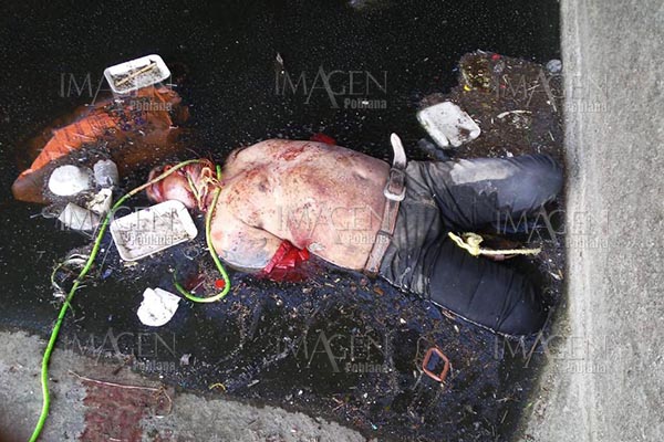 Localizan cuerpo de hombre mutilado en canal