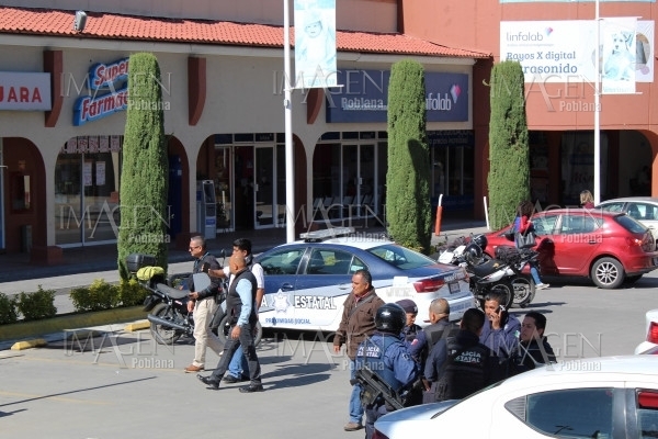 Balean a un escolta en intento de asalto en Plaza Tolín