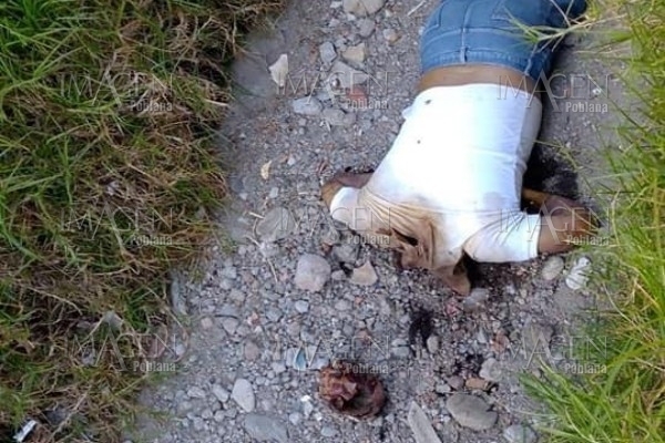 Abandonan cuerpo decapitado junto a un cementerio