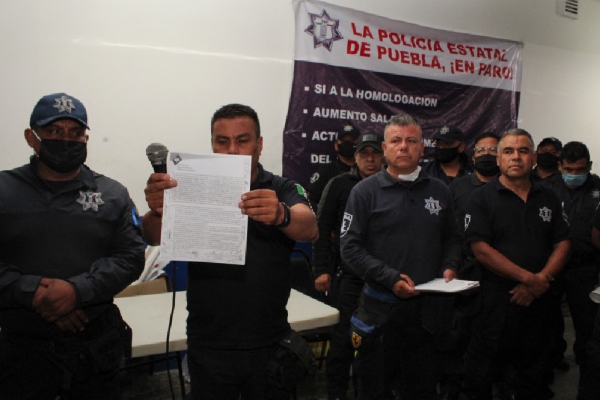 Policías preventivos terminan paro de labores con aumento del 20%