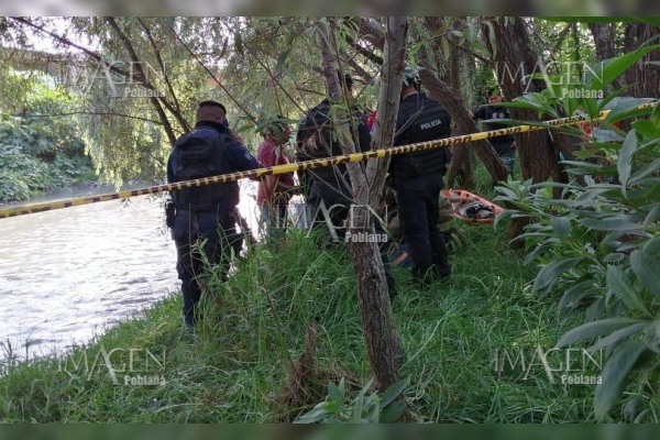 Encuentran el cadáver violentado de una mujer en río de Texmelucan