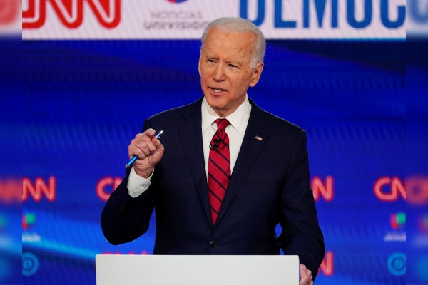 Biden promete vacuna de COVID-19 gratis para todos si gana presidencia