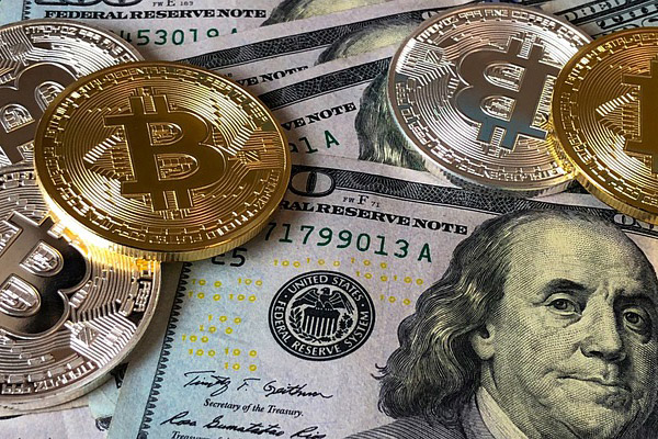El Salvador confirma al FMI que el bitcóin no sustituirá al dólar