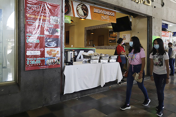Comercios, sin desbordarse pese a reapertura total en Puebla