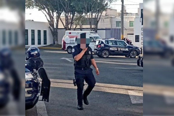 Dos policías resultan heridos: uno atropellado y otra con un disparo