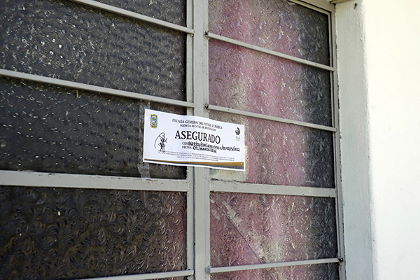 Despliegan cateos tras masacre en narcotiendita de Atlixco