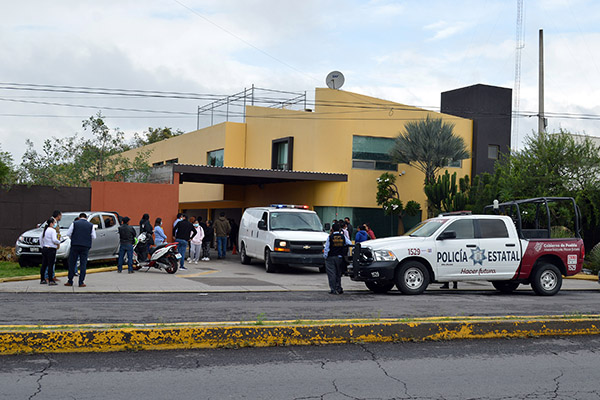 Investigan muerte de mujer desaparecida hallada en motel de Atlixco