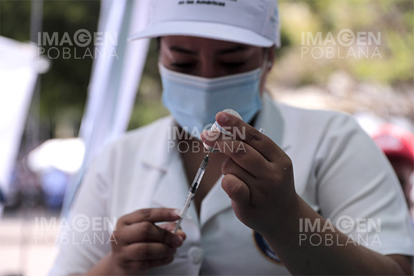 OMS enfatiza aplicación de vacunas ante temporada de influenza y COVID-19