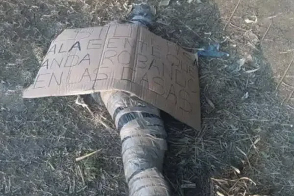 Encuentran cadáver embolsado con un mensaje
