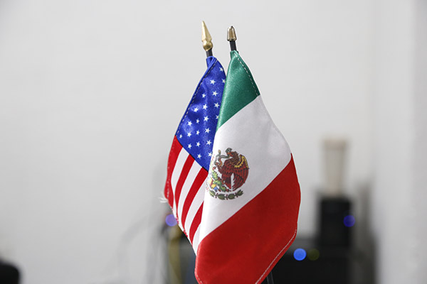 México y EU acuerdan combatir tráfico de personas, armas y drogas